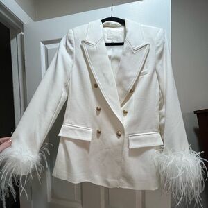 White bridal jacket with feather cuffs